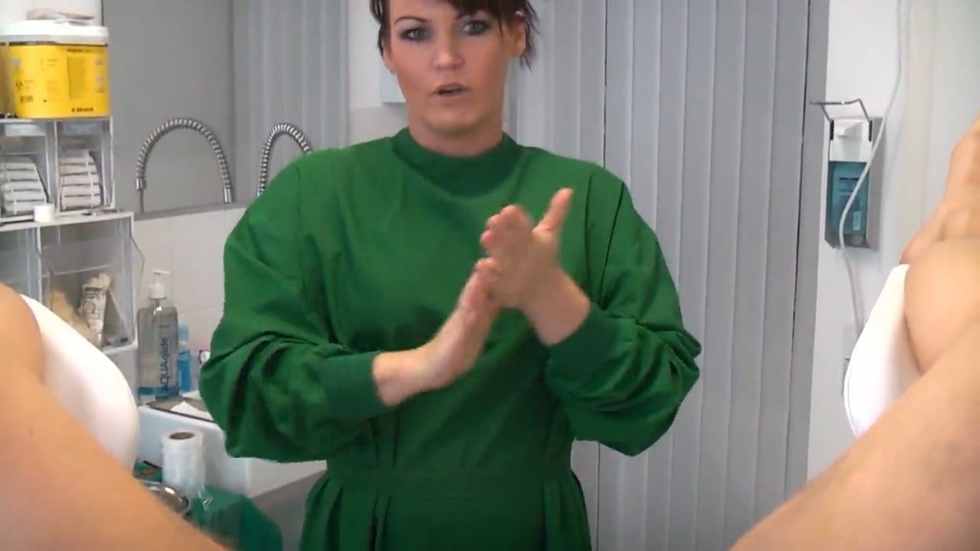 Allegra Smith in a consensual medical fetish video featuring a urethral dilator and electrical stimulation, reviewed by Mistress Katharina Amara